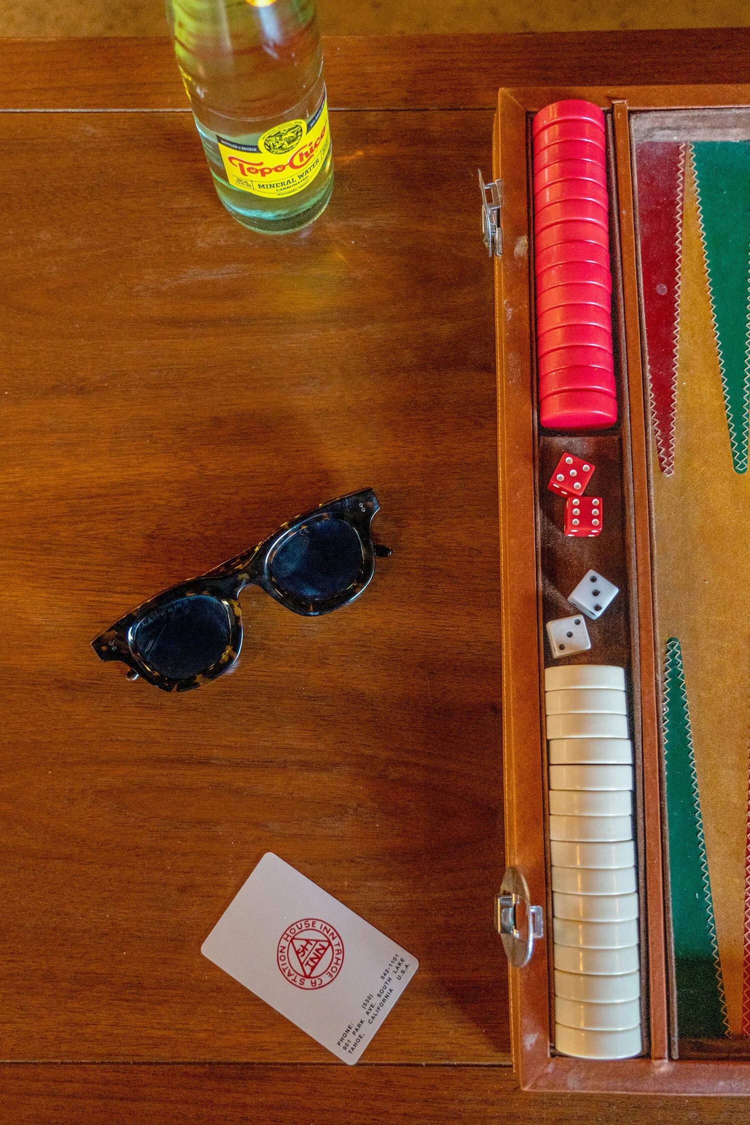 Board games and Topo Chico at Station House Inn