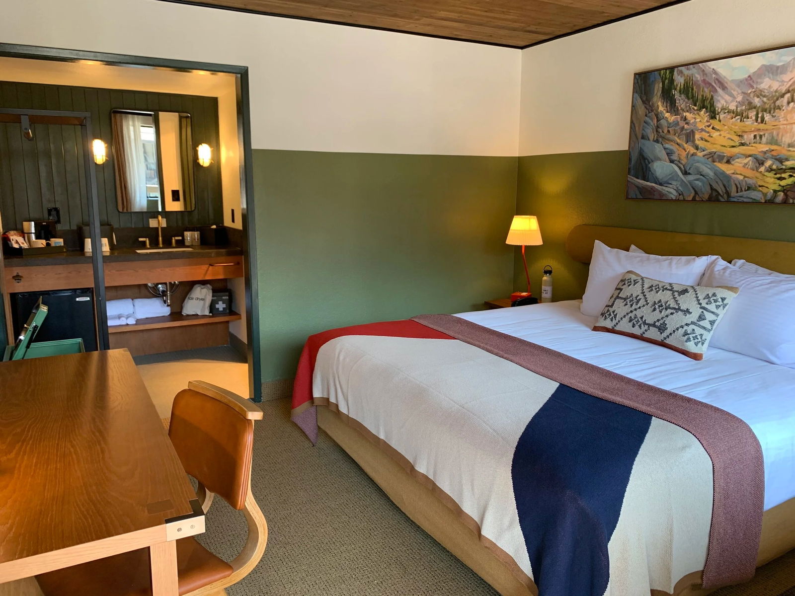 Cozy King room with warm lighting at Station House Inn