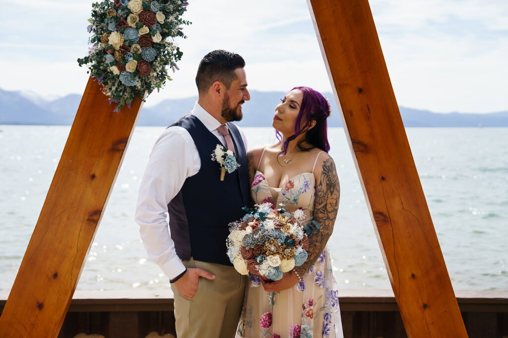 Bride and groom at their south lake tahoe wedding on the lake.