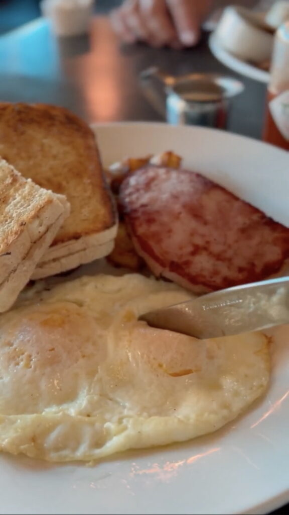 breakfast in lake tahoe at toulouse restaurant - eggs toast and ham