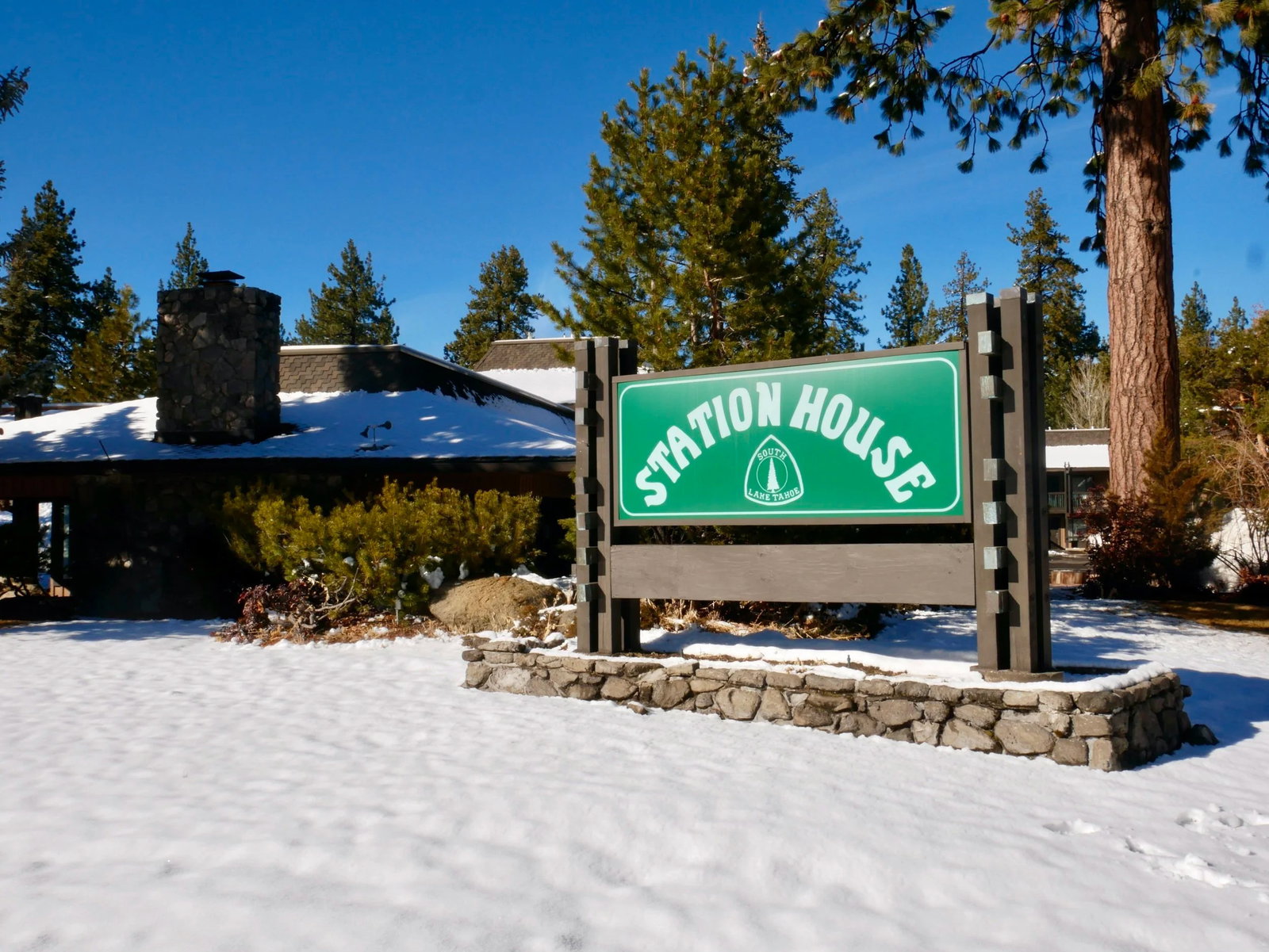 Station House Inn dusted with fresh snow in the walkable heart of South Lake Tahoe