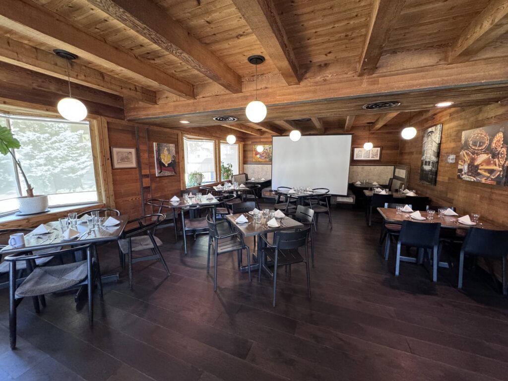 Toulouse private dining room at Station House Inn set for a meeting with projector screen, South Lake Tahoe